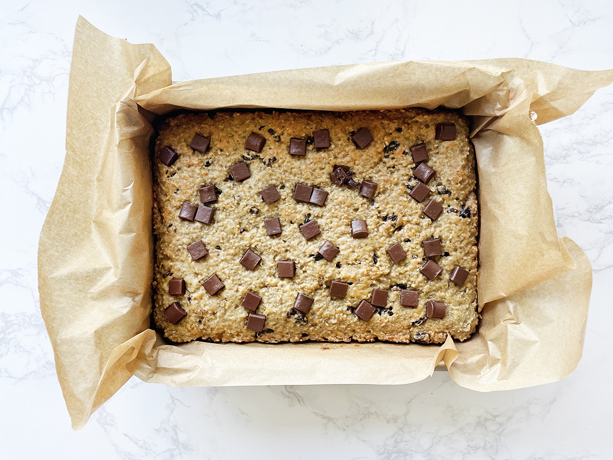 Steel cut oatmeal bars with chocolate chips just out of the oven.