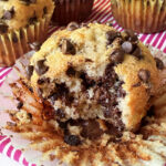 Banana chocolate chip muffin with bite taken out.