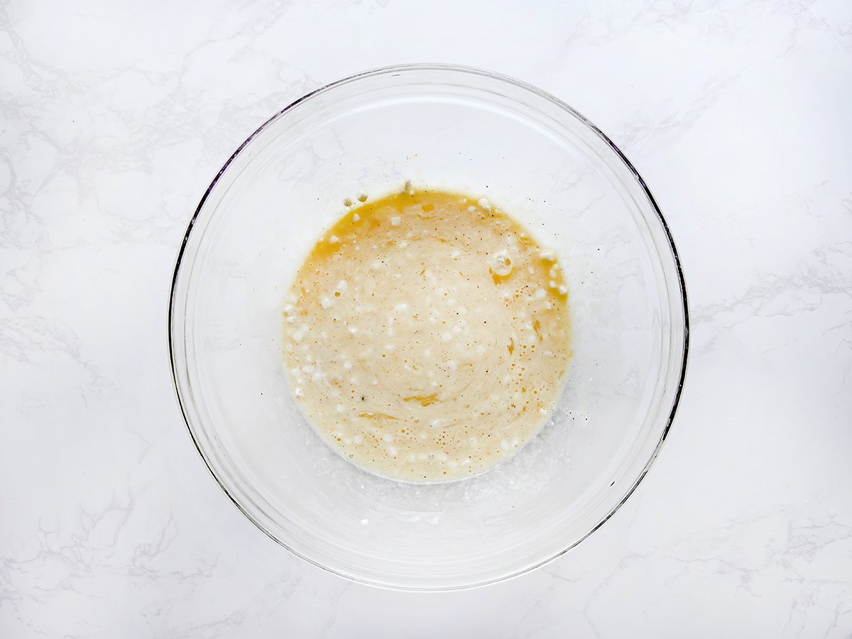Egg mixture in a glass bowl.